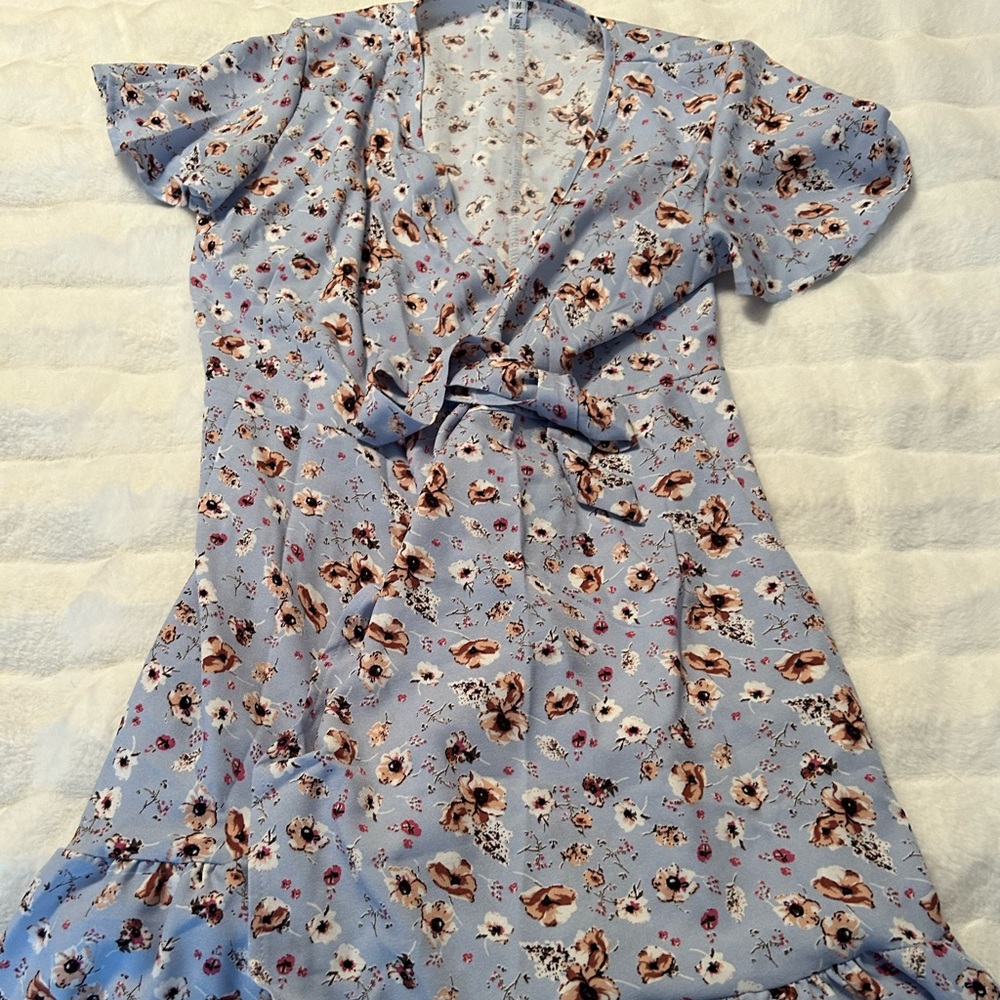 Women’s floral wrap dress.